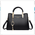 Hand-held Leather Shoulder Bag for Women 2024 (One Piece) in sleek black design with gold accents and charm.