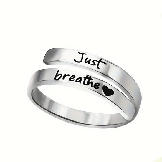 Anillo de corazón en espiral plateado