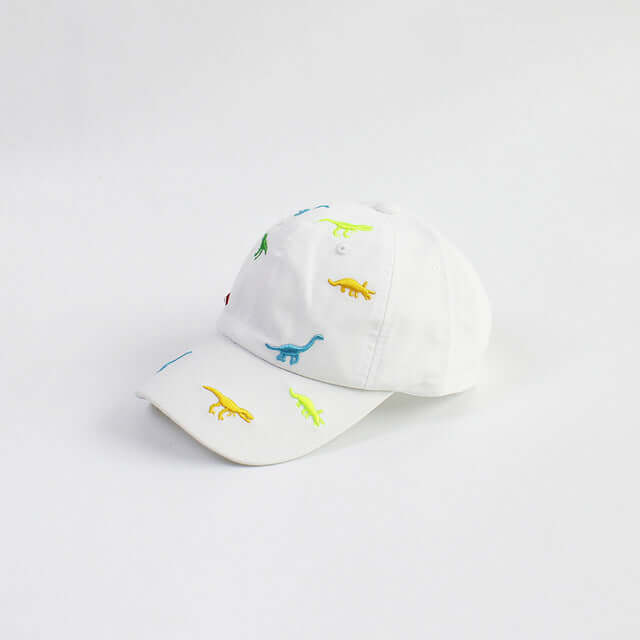 RICYGVM Dinosaur Embroidered Kids Baseball Cap showcasing colorful dinosaur designs on a white baseball cap.