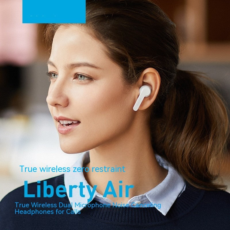 Woman wearing Liberty Air true wireless headphones with product name displayed.