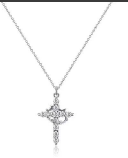Silver cross pendant necklace on a white background