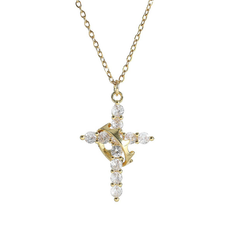 Gold cross pendant necklace with diamonds on a white background
