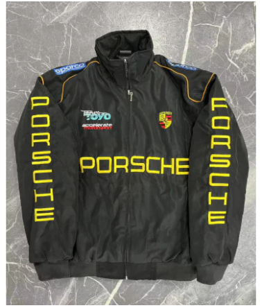 Black Porsche jacket with yellow text on a textured gray background