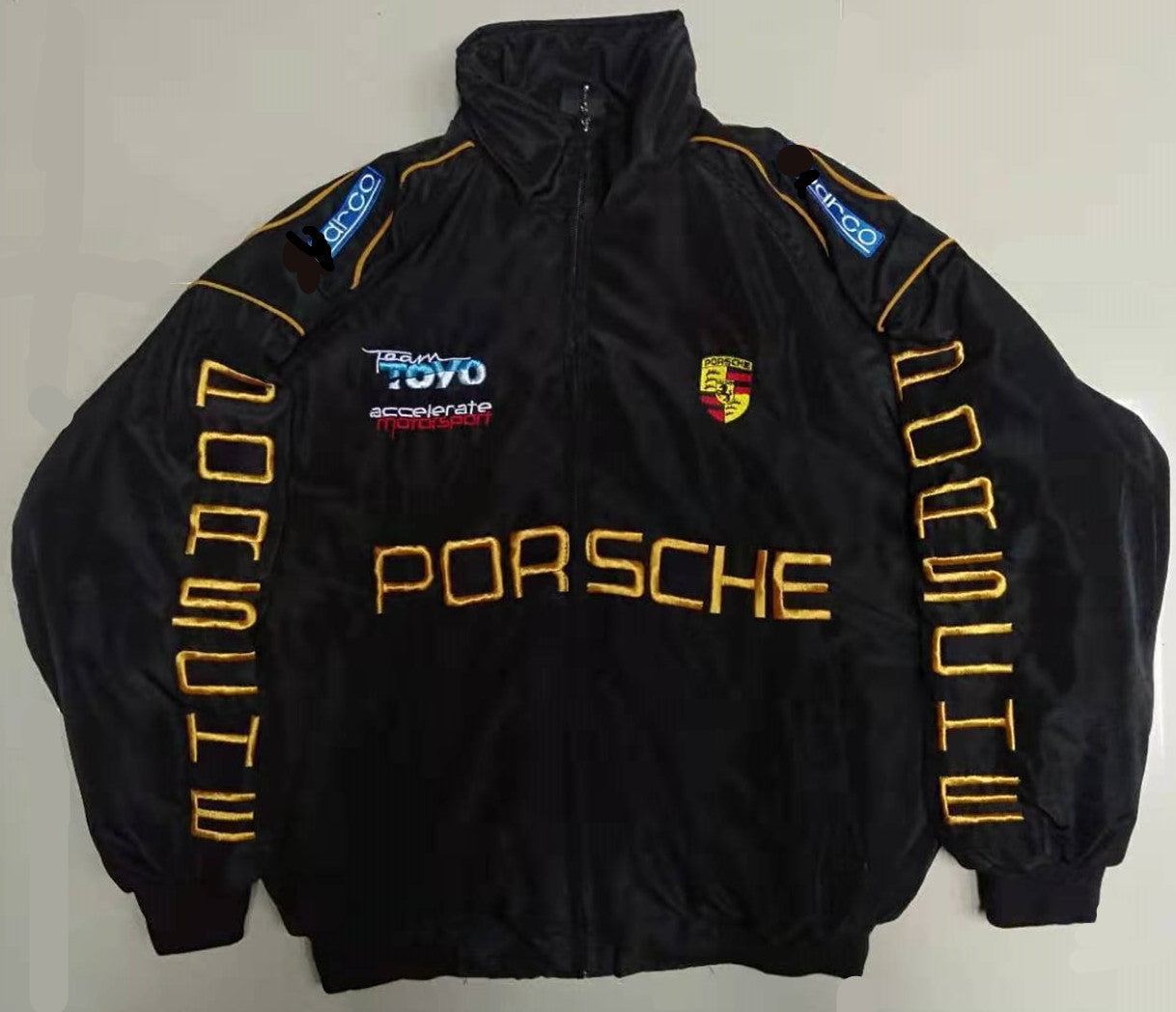 Black Porsche jacket with logos on a white background