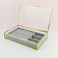 Elegant Jewelry Box Organizer with compartments, gold trim, and clear lid for stylish storage.