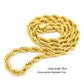 Gold rope chain necklace on a white background