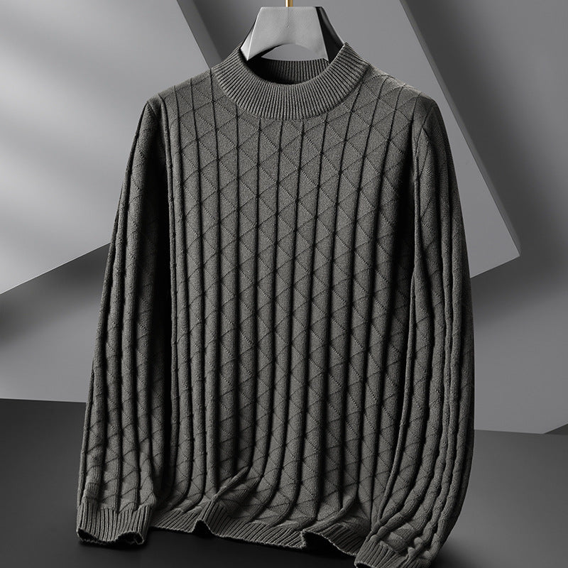 Gray turtleneck sweater on a gray background