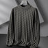 Gray turtleneck sweater on a gray background