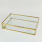 Jewelry Box Organizer - elegant glass and gold frame for stylish jewelry storage.