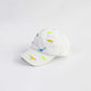RICYGVM Dinosaur Embroidered Kids Baseball Cap showcasing colorful dinosaur designs on a white baseball cap.