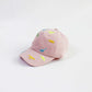 RICYGVM Dinosaur Embroidered Kids Baseball Cap featuring colorful dinosaur designs on a pink background.