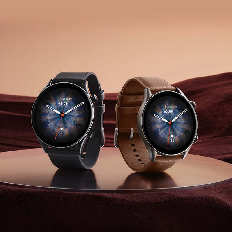 Amazfit GTR3 Pro Smartwatch with GPS and Health Monitor displayed in black and brown straps on elegant surface.