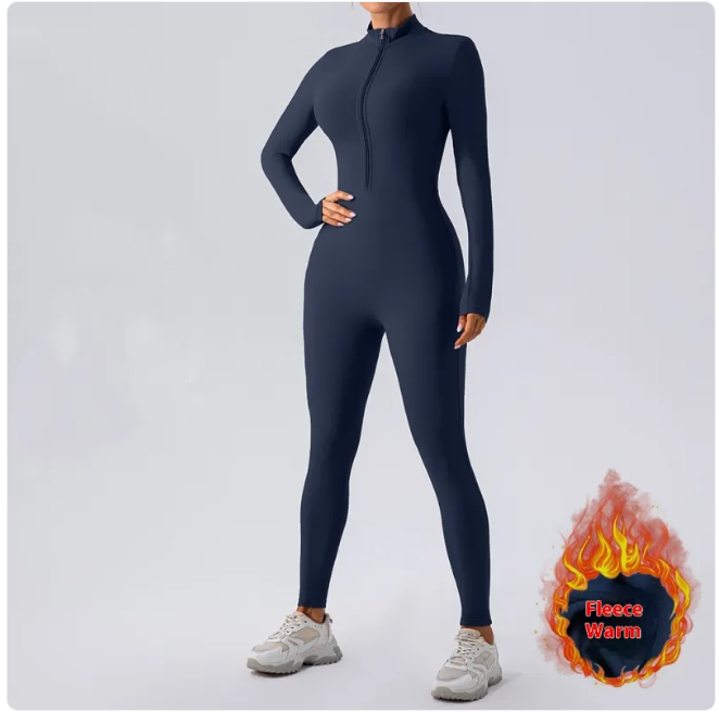 Person wearing a navy blue full-body suit with &