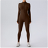 Brown full-body suit worn by a person on a light gray background