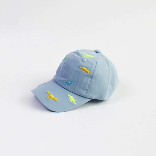 RICYGVM Dinosaur Embroidered Kids Baseball Cap featuring colorful dinosaur designs on a light blue background.