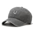 Smile Face Cotton Baseball Cap Adjustable for Women Men in gray color with a smiley face embroidery.