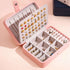 Smart Jewelry Box with organized compartments for earrings, rings, and necklaces, stylish travel-ready design.