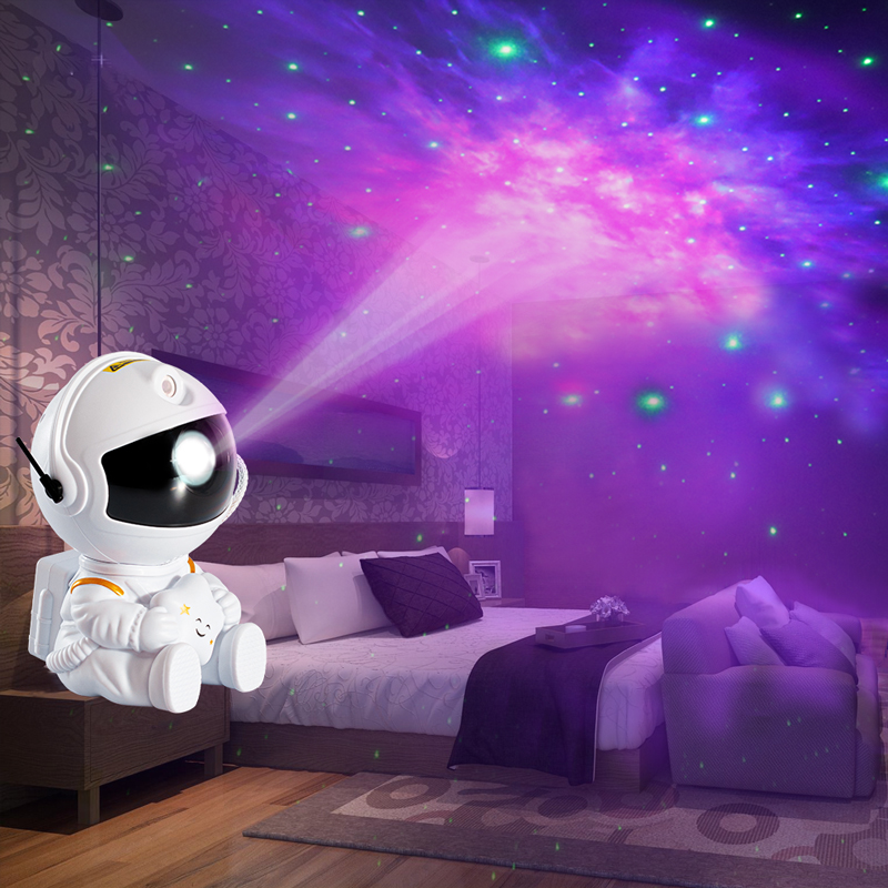 Astronaut Galaxy Projector illuminating a bedroom with colorful nebula effects.