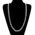 Silver rope chain necklace on a black mannequin bust.